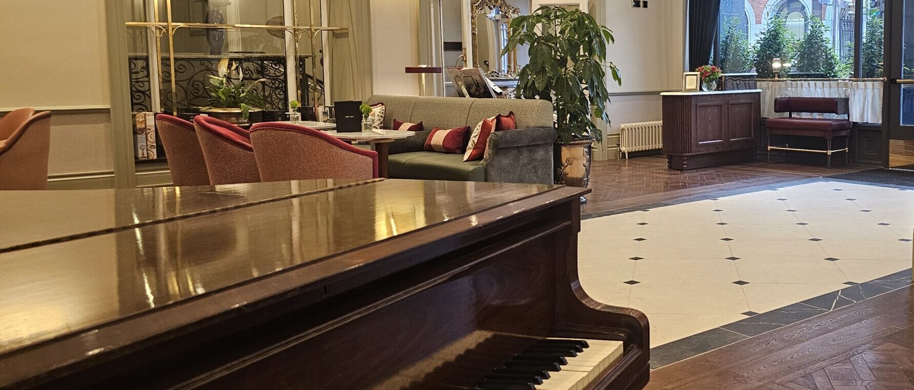 Piano in the lobby at Metropole Hotel Cork